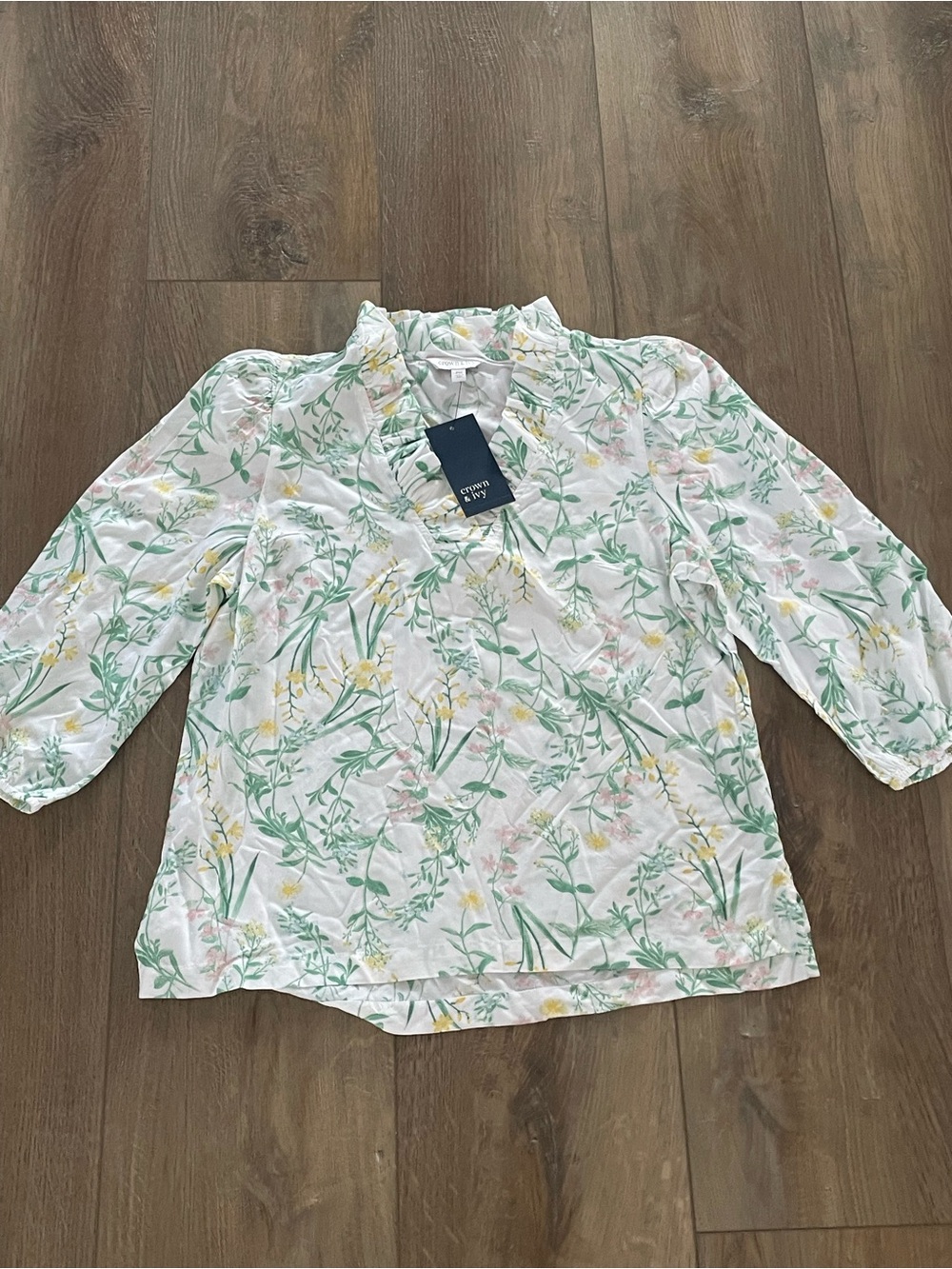 crown & ivy White Floral V-Neck Top with Green Leaves and Yellow Blooms